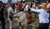 Cambodian PM’s cousin says owned 30% of scam-linked firm