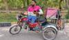 For Pakistani food rider who lost both legs, Eid homecoming crowns year of struggle