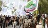 Powerful Iran-backed militias in Iraq say they will start handing in weapons to authorities