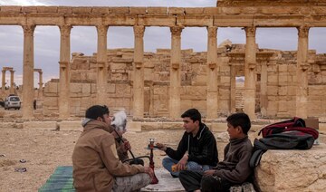 Syrians back to famed Palmyra ruins scarred by Daesh