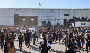 Thousands storm aid warehouse in Gaza as hunger crisis deepens