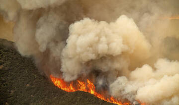 Massive wildfire in central California threatens homes, injures 3 people as it burns out of control