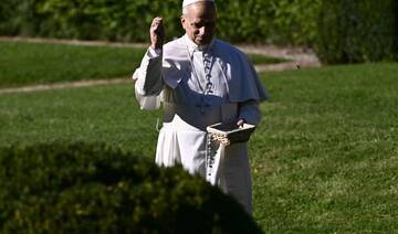 Pope feeds fish as he opens Vatican’s ambitious model of sustainable farming and education