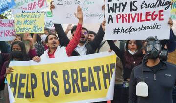 Citizens shout slogans during protest against what they called government’s lack of action to combat air pollution in New Delhi.