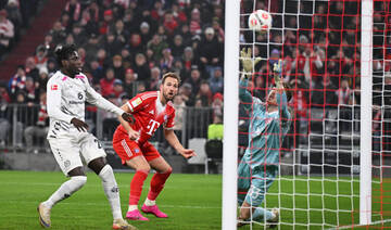 Late Kane penalty saves Bayern point against rock bottom Mainz
