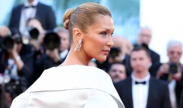 Bella Hadid hits the Cannes red carpet in a Prada gown 