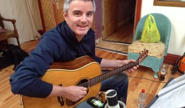 AI helped a musician with Parkinson’s finish his new album when he could no longer play guitar