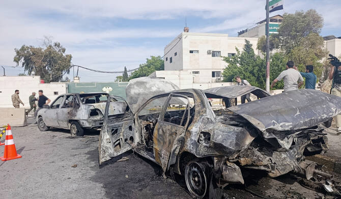 Syrian soldier killed, 18 people wounded by car bomb in Damascus
