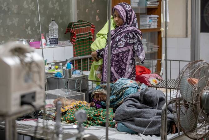 Children receive measles treatment inside a paediatric ward at the Bangladesh Shishu Hospital and Institute in Dhaka.